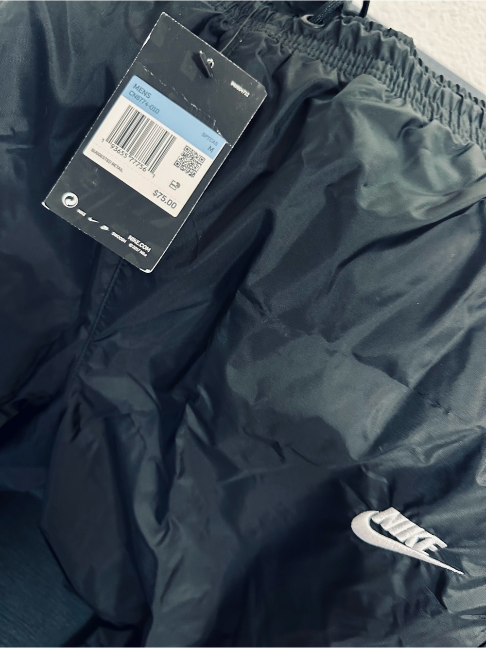 Classic Nike Black nylon woven windbreaker tapered track pants size Medium “New”